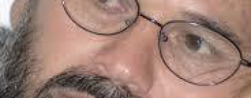 CEO Abdullah Pledges Reassessment of Afghan Photographer's Case